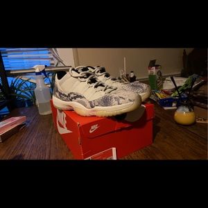 Jordan 11 Retrow Low Snake Light Bone SZ 12. Worn once, clean goes with any fit.